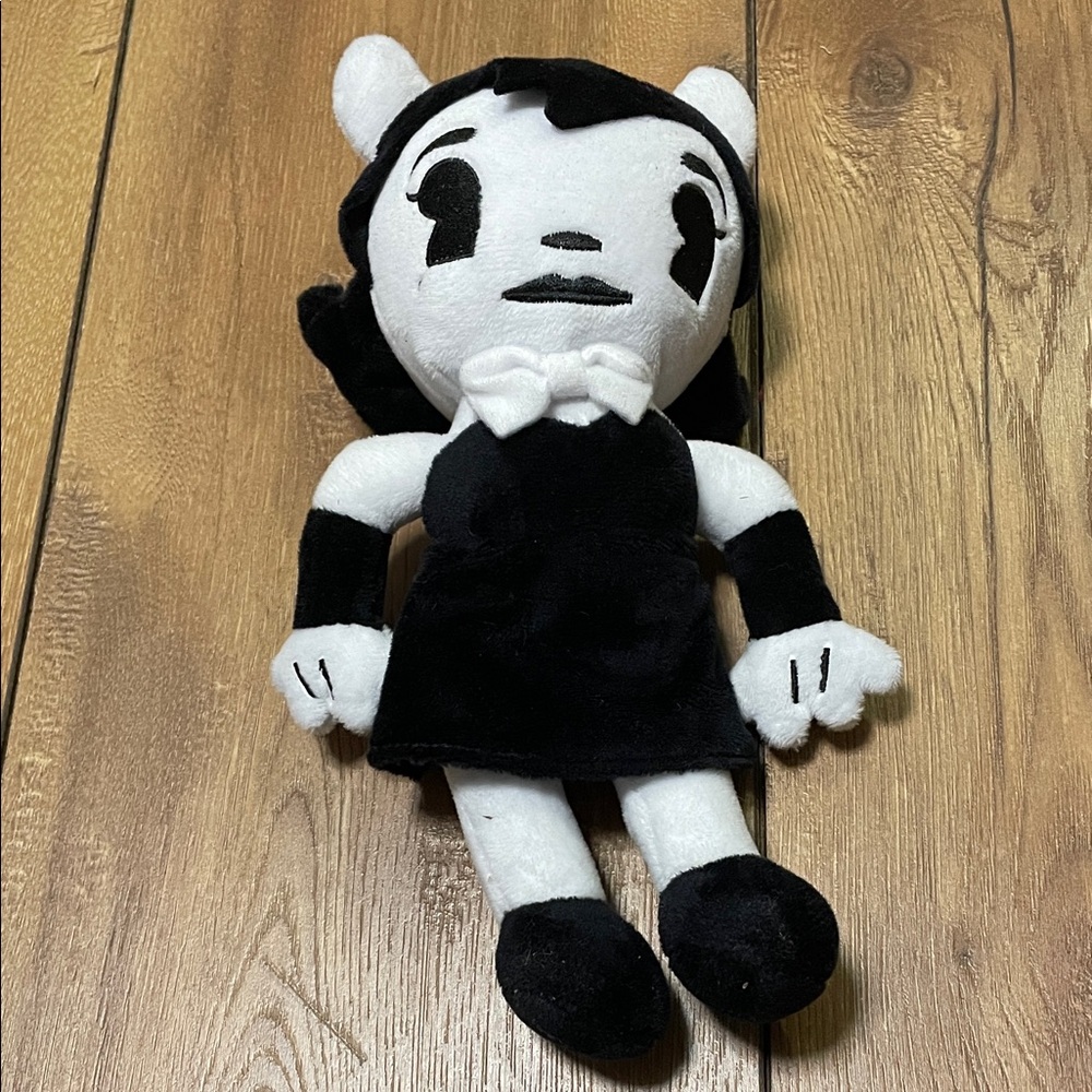 Adorable Black and White Plush Toy